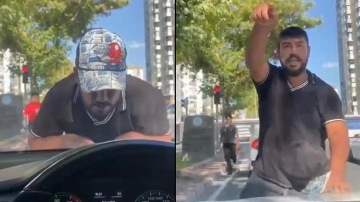 Cam silme bahanesiyle aracın kaputuna yatıp zorla para istemişti, tutuklandı