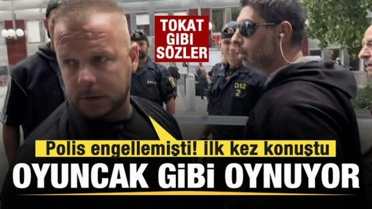 Kur'an-ı Kerim'in yakılmasına karşı &ccedil;ıktı, polis susturdu! Tokat gibi s&ouml;zler