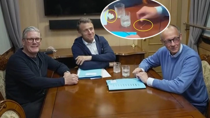 Macron ve Merz uyuşturucuyu mu gizledi? Ukrayna yolunda kameralara yakalandılar