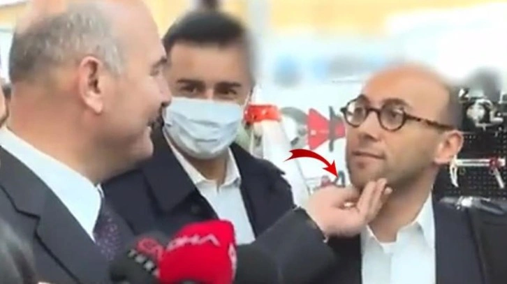 Soylu, hanelere kayıtlı yabancılar bulunduğu iddiasını soran muhabirin &ccedil;enesine dokunup "canım