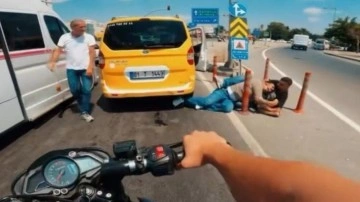 Adana'da iki gencin yolun ortasında telefon kavgası