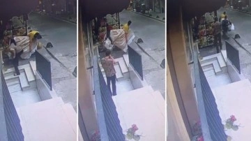 Hırsız &ccedil;aldığı televizyonu taşımakta zorlanınca esnaf yardım etti