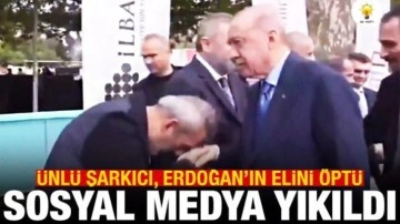 Ünlü şarkıcı, Erdoğan'ın elini öptü; sosyal medya yıkıldı